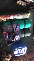 All items: tent bag, two air mattresses, tarp, and water container together
