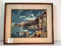 Full view of framed oil painting showing boats and dock with water in blue-gray palette.