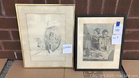 Two framed black and white drawings: eagle and eaglet on left, people eating dinner on right, with size labels visible