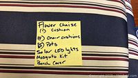Photo of handwritten note describing lot contents