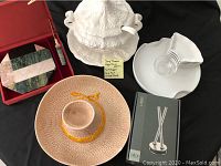 Top image displaying white ceramic soup tureen with matching spoon, drip dish, appetizer dishes, salt and pepper dispenser, chip hat, and green marble cheeseboard with knife.