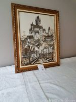 Framed Chateau Frontenac print displayed front view showing detailed image and frame design.