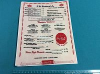 Full view of the reproduction Woolworth menu showing food items and prices.