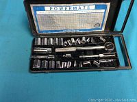 Full view of Powermate socket set including sockets, ratchet, extensions in carrying case.