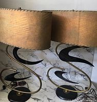 Front view of both lamps showing overall shape, shades and bases