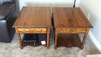 Front view of both oak end tables side by side