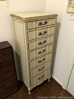 Front view of the lingerie chest showing all seven drawers closed.