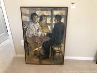 Full view of framed painting showing three figures at table