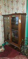 Full front view of solid wood display cabinet