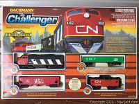 Front of Bachmann The Challenger HO scale electric train set box showing included diesel locomotive and cars and E-Z Track system branding.