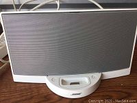 Front view of Bose speaker dock with power and dock connectors visible