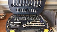 Full socket and wrench set arranged in open case showing all included pieces