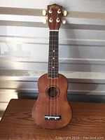 Full front view of the Hilo ukulele showing the headstock, neck, and body.