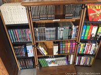 Full view of cabinet with DVDs