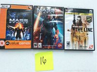 Three PC game cases: Mass Effect (EA Value Games edition), Mass Effect 3, Spec Ops The Line, arranged side by side.