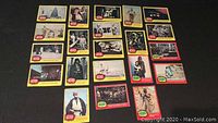 Full set of 21 Star Wars trading cards arranged in a grid showing the yellow and red border cards.
