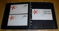 Two pages from the album showing First Day Covers with flower designs and ship stamps postmarked in 1979.