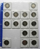 Photo showing Canadian 50 cent coins from 1991 to 2010 (missing some years) in individual coin holders in a plastic sheet with blue binding.
