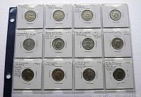 Sheet of 12 Canadian nickels in coin flips with handwritten labels describing errors like die attach issues and repunched dates.