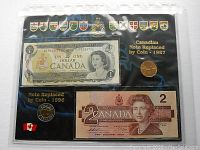 Page showing one dollar bill from 1987 with replacement Loonie coin and two dollar bill from 1996 with replacement Toonie coin in a protective holder.