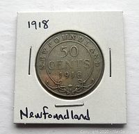 Reverse side of the 1918 Newfoundland 50 cents coin showing denomination, year, and decorative scrollwork.
