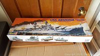 Box of Revell USS Arizona battleship model kit showing full artwork on top of the box.