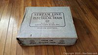 Closed original cardboard box labeled 'Stream Line Steam Type Electrical Train' made by Louis Marx & Co, Inc.