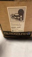 Label on the original box showing Bell and Howell logo, Filmosound 8 branding, and model 458Z specification for the movie projector.