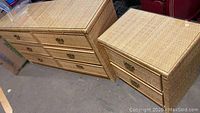 Full view of the rattan dresser and nightstand side by side showing their overall construction and glass tops.