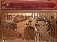 Front view of the Ten Pound gold banknote with Certificate of Authenticity showing the gold banknote and red label on top.