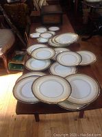 Overview of all plates arranged on wooden table