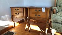 Pair of wooden side tables placed side by side showing front and side views