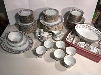 Full assortment of Noritake Venice pattern dinnerware laid out