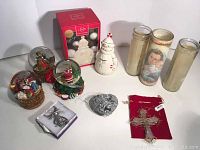 Entire lot showing all figurines, music boxes, ornaments, and candles together