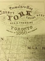 Close-up of ornate title text and map details reading 'Tremaine's Map, County York, Canada West, Toronto, 1860'