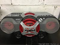 View of the Sony CD Radio Cassette Corder showing front speakers and control buttons on top.