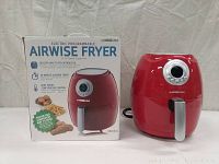 Red GoWISE USA AirWise electric programmable air fryer with digital control, silver handle, next to its retail box on white background.