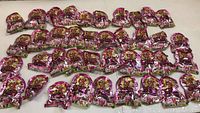 Lot of 40 individually packaged Filly Princess kids toys arranged on a flat surface, showing the quantity and consistency of packaging.