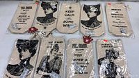 Lot of 10 new wine cases with printed vintage-style designs and red JHC crown tags shown in original packaging.