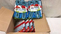 Lot contents showing 10 Double Dutch jump ropes packaged 2 per pack inside a cardboard box.