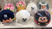 Lot of 7 brand new large stuffed Beanie Balls with tags shown on white surface, including various animal and character designs.
