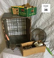 Photo of entire lot showing wooden and metal milk crate, two wire mesh strainers, and boxes containing the cookie press and hand grinder.