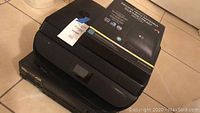 Photo showing HP printer model 5232 placed on top of Technics stereo receiver.