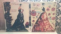 Both canvas prints side by side highlighting fashion-themed artwork and text