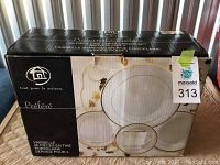 Photo of the original black and white box labeled 'Préféré 20 piece fine porcelain dinner set service for 4'