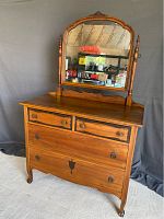 Full front view of dresser with mirror attached