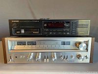 Top: PD-M430 CD player stacked on SX-780 receiver