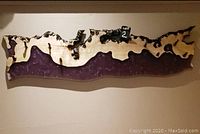 Front view of the live edge epoxy handmade coat hanger showing natural wood with purple epoxy resin and metal hooks.