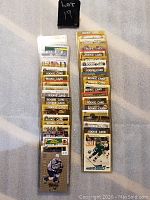 Two vertical stacks of 40 NHL rookie cards in protective sleeves, each card labeled 'Rookie Card'.