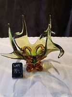 Front and side view of art glass modern centerpiece showing organic upward curves and color blend